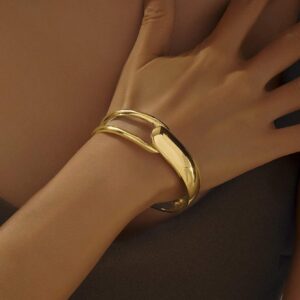 Pulseira de Metal Oca Assimétrica, Design de Nicho Elegante e Minimalista.